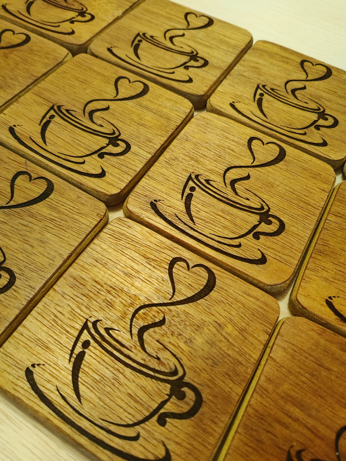 Laser engraved coffee wooden coasters , one heart