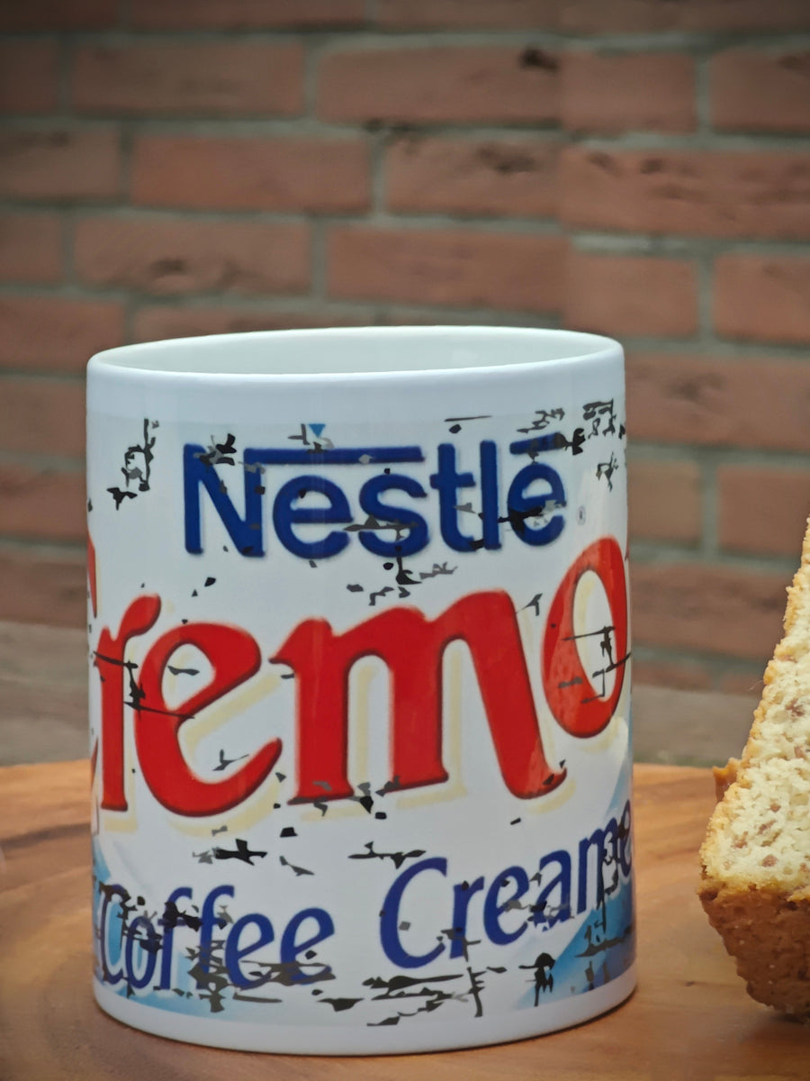 Close-up of Cremora coffee mug showing fun creamy swirl design and smooth ceramic finish