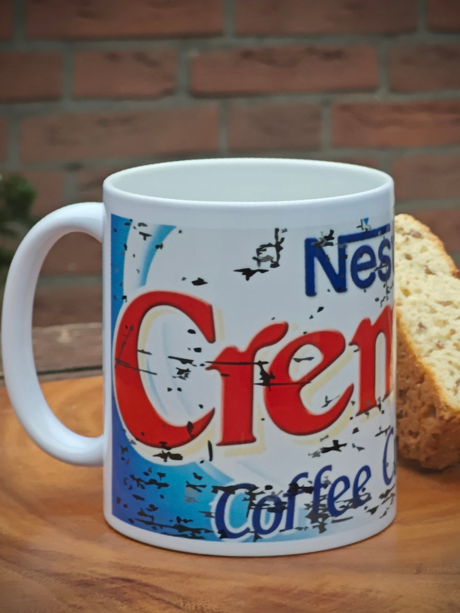 Cremora Coffee Cream Fun Mug on breakfast table with steaming hot coffee.
