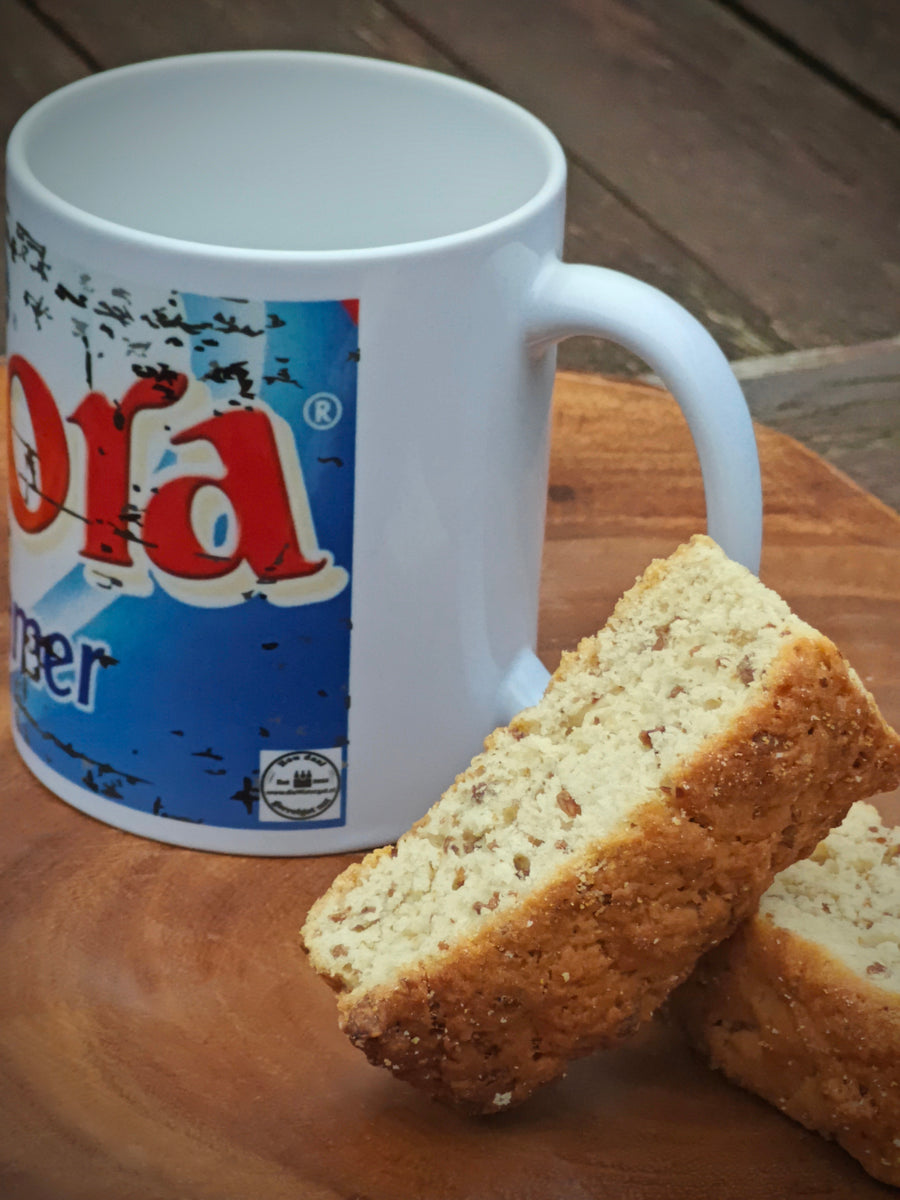 White ceramic Cremora coffee cream mug – dishwasher and microwave safe.