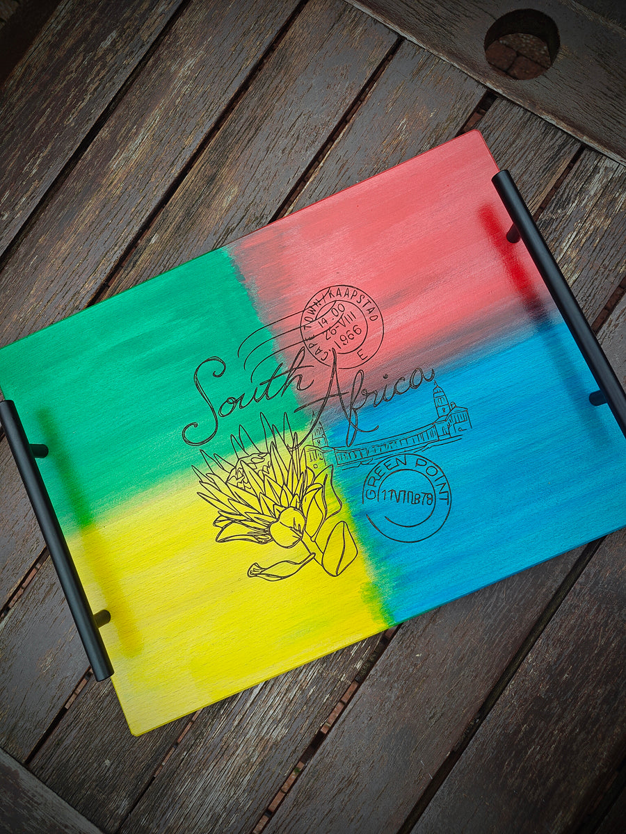 Artisan Nostalgic South Africa serving tray with sturdy metal handles.