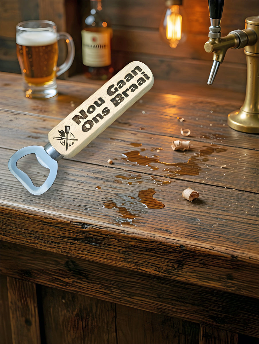 Classic bottle opener - with magnet in handle description in Afrikaans "nou gaan ons braai"