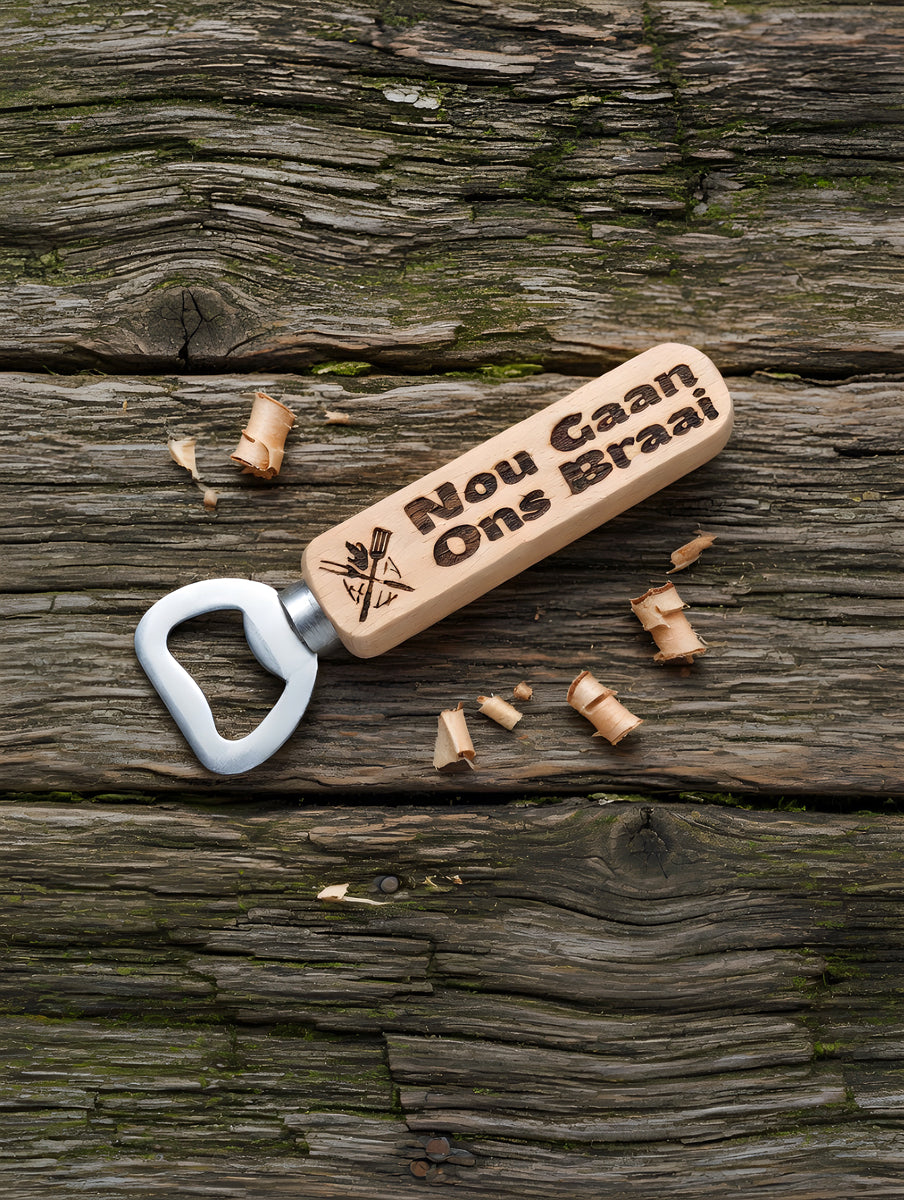 Classic bottle opener - with magnet in handle description in Afrikaans "nou gaan ons braai"