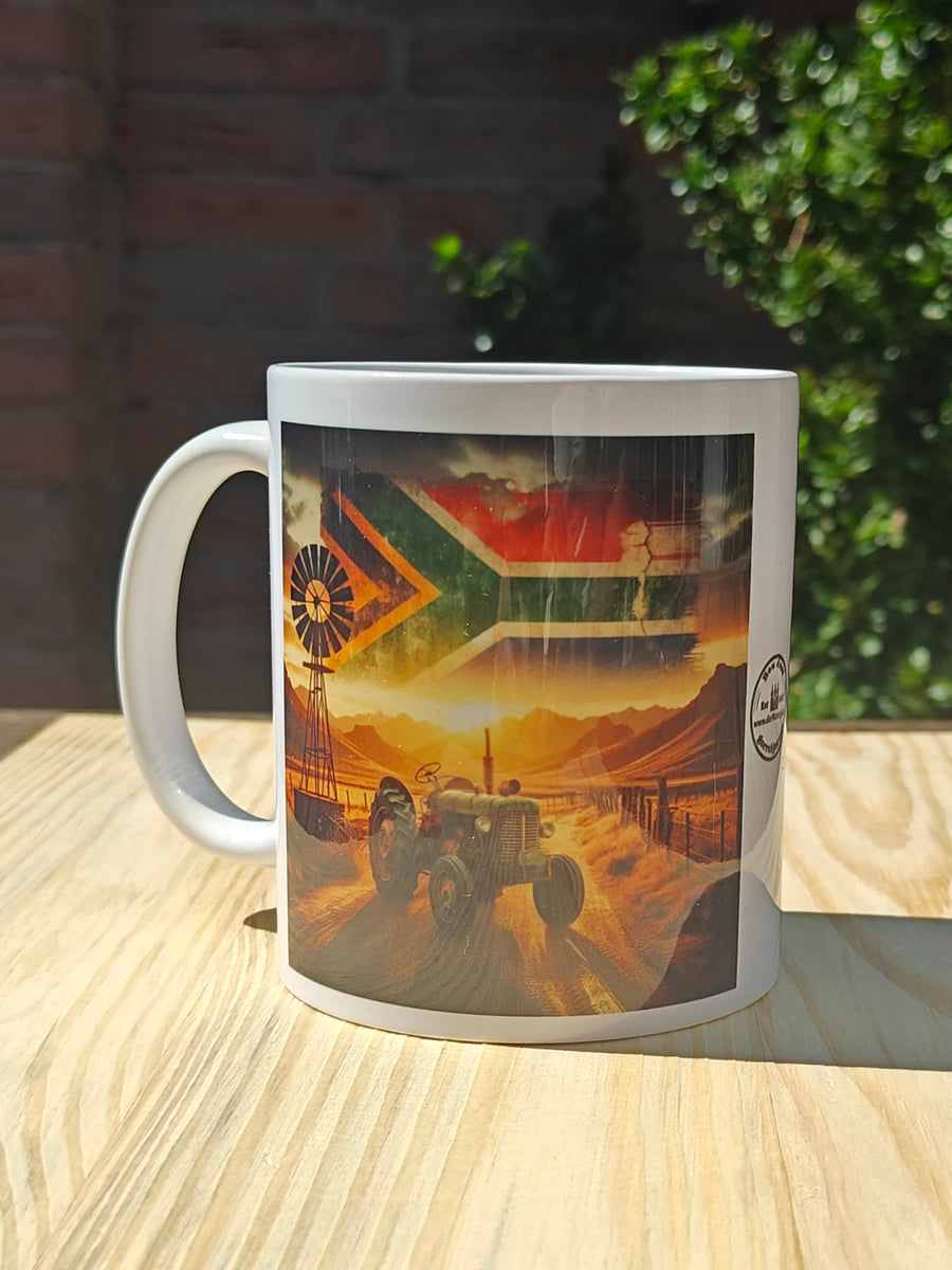Proudly South African Tractor Mug – Rustic Green Tractor, Flag in Sky, Windmill, Fence & Mountain Scene