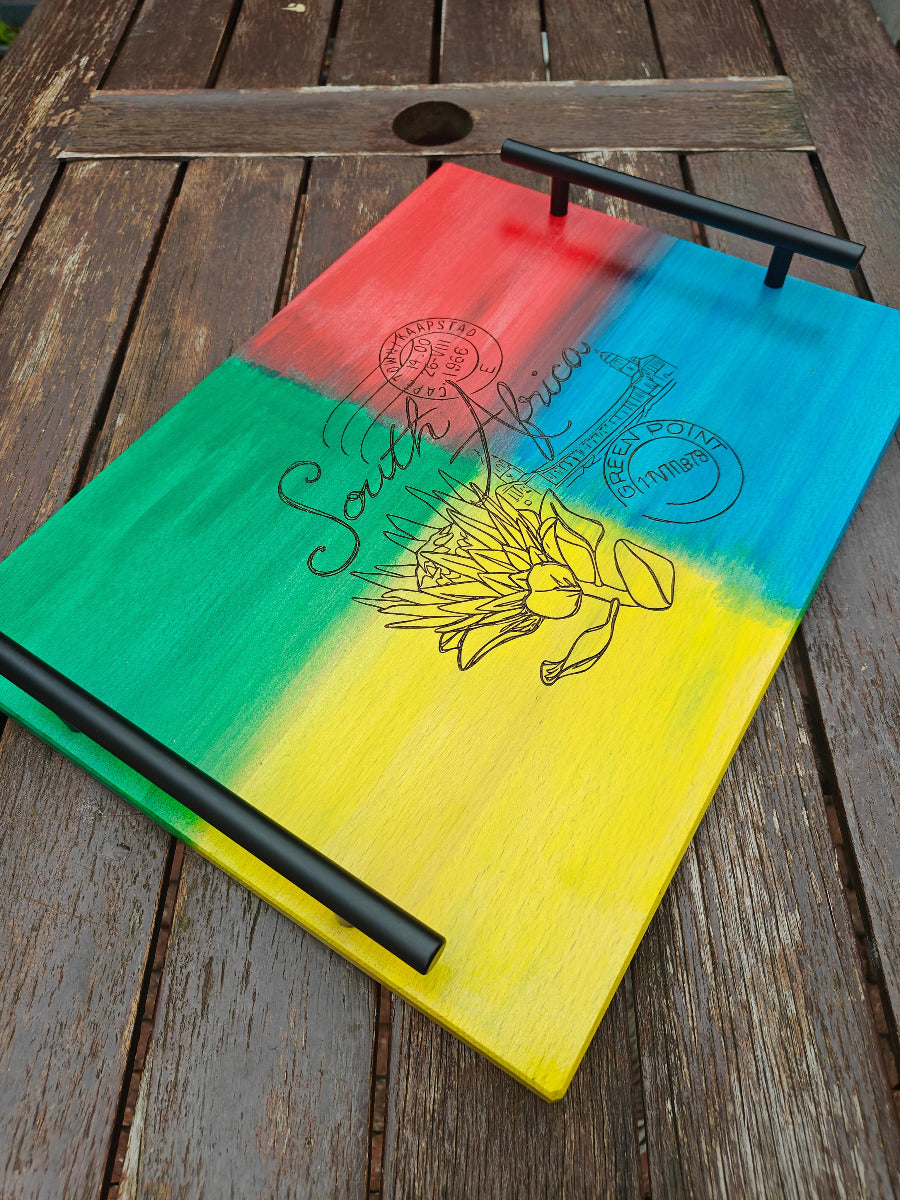 Nostalgic South Africa serving tray with sturdy metal handles.