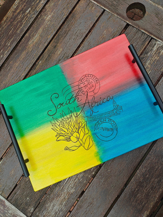 Nostalgic South Africa serving tray with sturdy metal handles.